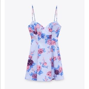 NEW Floral mini dress with adjustable straps. 65% cotton 30% nylon  5% elastane